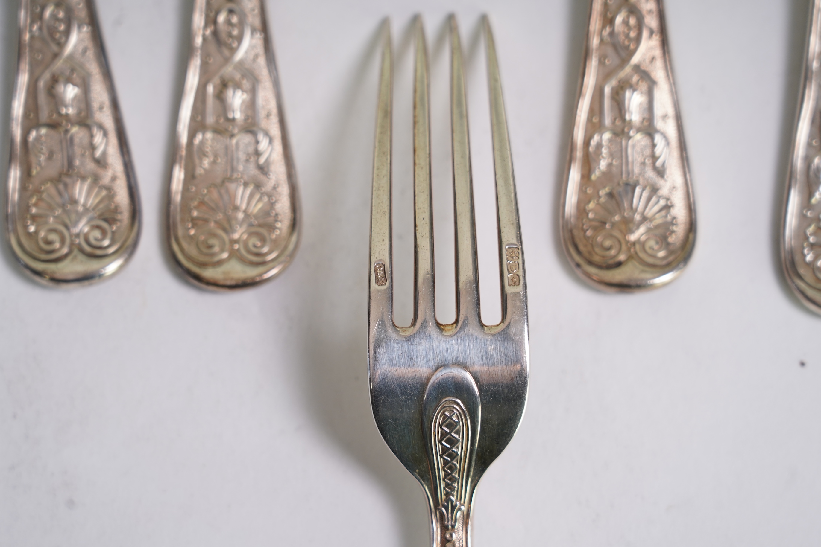 A harlequin set of twenty one Victorian and later silver fancy pattern table forks